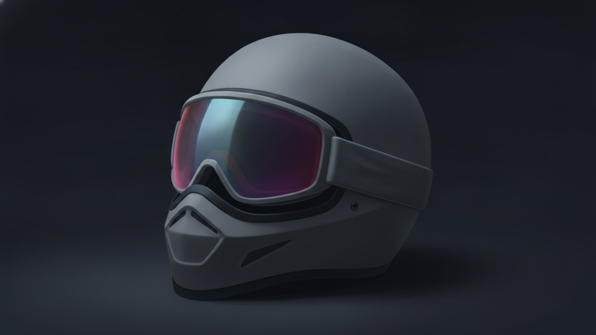 Illustrazione: una maschera da BMX con cinturino elastico agganciata alla mentoniera di un casco integrale